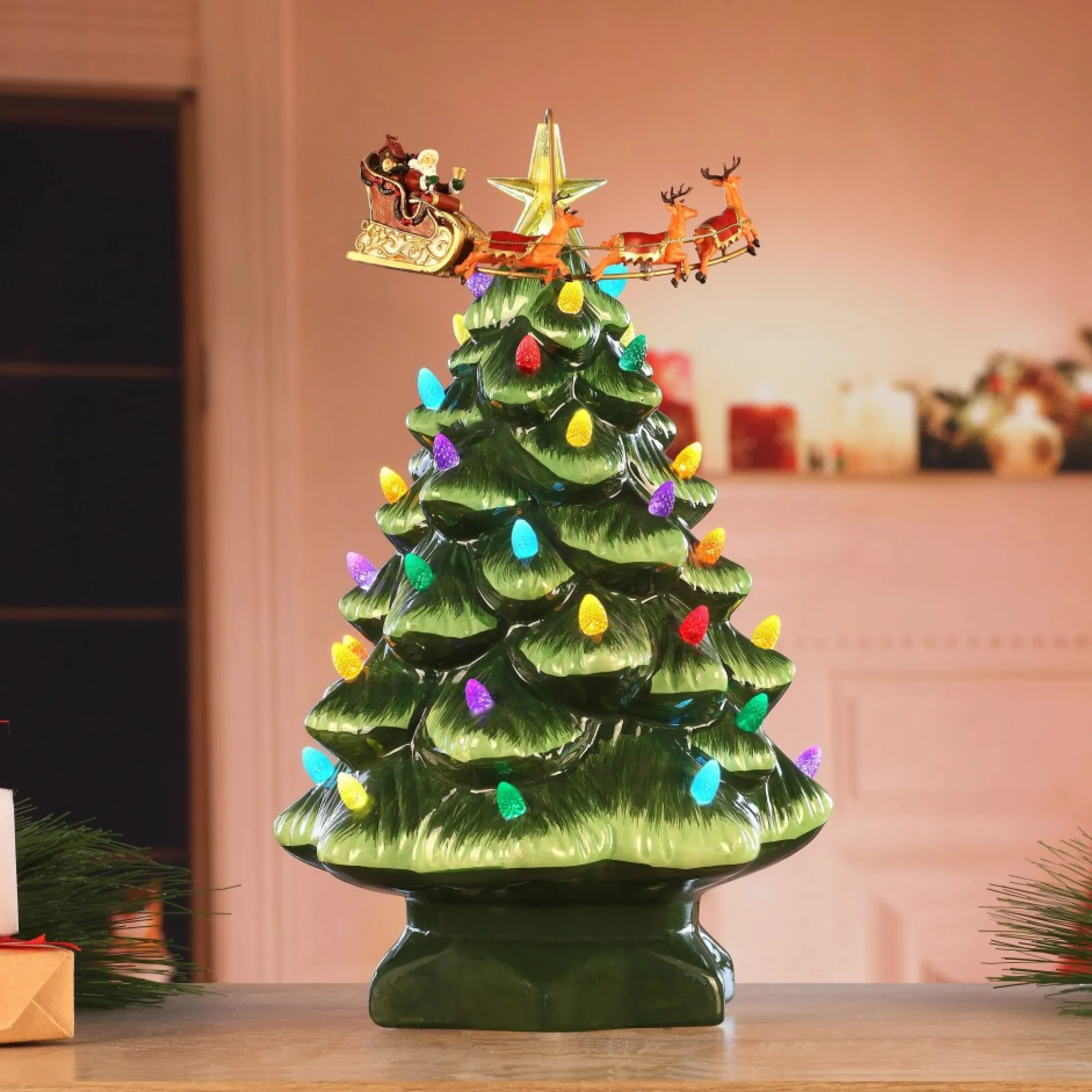 animated_nostalgic_ceramic_tree__santas_sleigh_1.webp Store Mr. Christmas 14" Animated Nostalgic Ceramic Tree - Santa's Sleigh